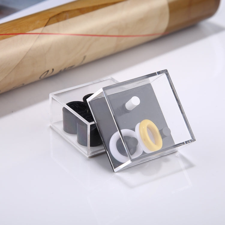 Close-up reducer toy set box with gray panel and white plus yellow ring pieces