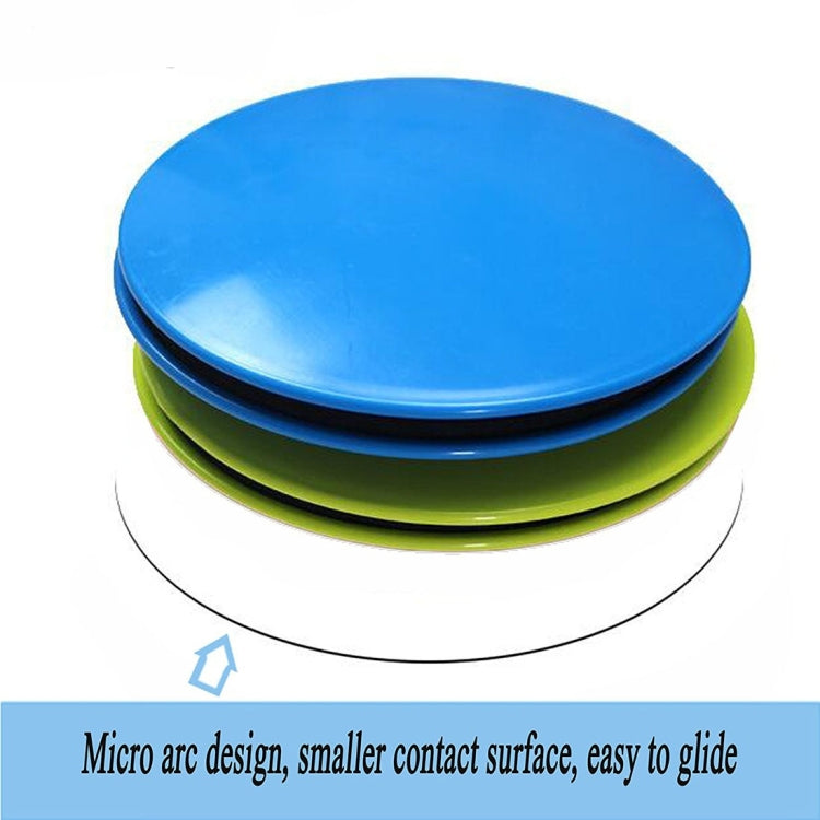 Stack of round gliding discs in blue and green with black slip surface