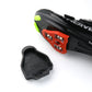 Black rubber cleat cover cap with hole, shown near a cycling shoe sole, LOOK KEO