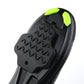 Black cycling shoe with black rubber cleat cover and bright neon green accents