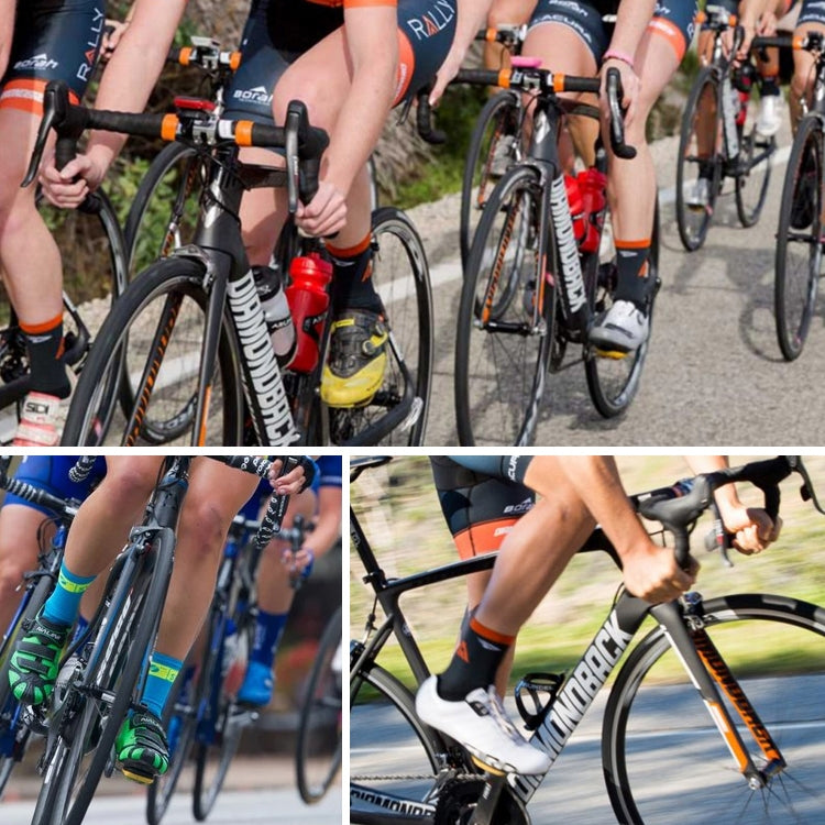 Cyclists riding road bicycles in a race group