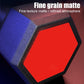 Hexagon dumbbell with red faceted end surface and fine-grain textured gray weight