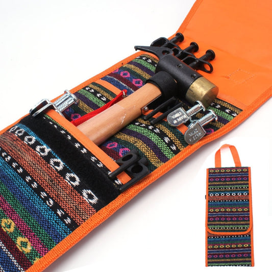 Tent nail peg pouch open view with black hammer head and multicolor patterned straps