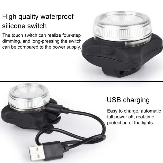 Black bicycle light with clear lens and USB charging cable