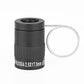 Black mini telescope with ridged grip and metal finger loop; text band on body