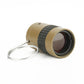 Gold mini pocket telescope with ridged focus ring and metal finger loop strap