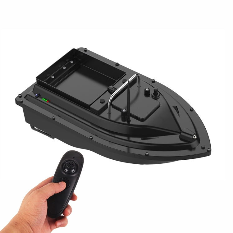 RC bait fishing boat with open hopper and remote control handset