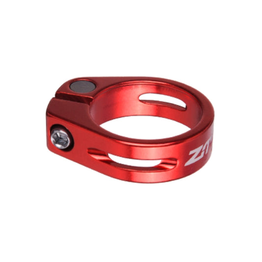 Red aluminum bike seatpost clamp, oval cutouts, tightening bolt visible.