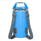 Blue waterproof dry bag, roll-top opening with gray webbing shoulder straps and buckles.
