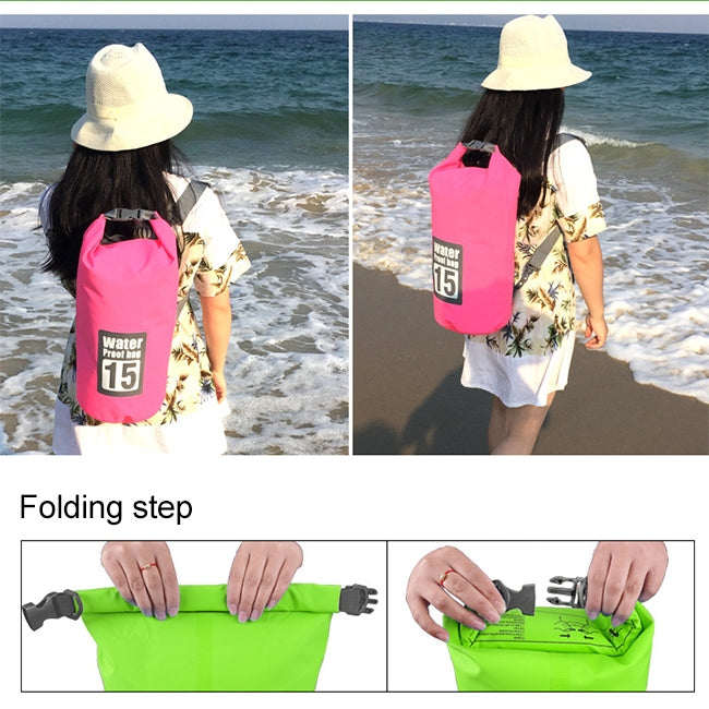 Pink waterproof dry bag with roll-top closure, worn across the shoulder.