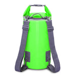 Green waterproof dry bag with dual shoulder straps and roll-top buckle closure