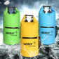 Set of waterproof dry sack bags in green, yellow, and blue with dual shoulder straps