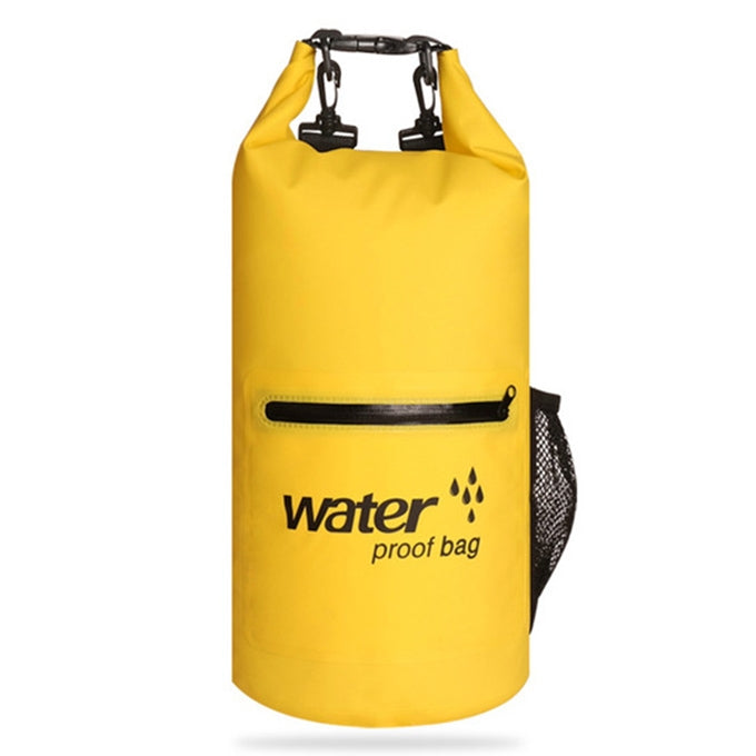 Yellow waterproof dry sack bag with roll-top buckles, front zip pocket, and mesh side pouch