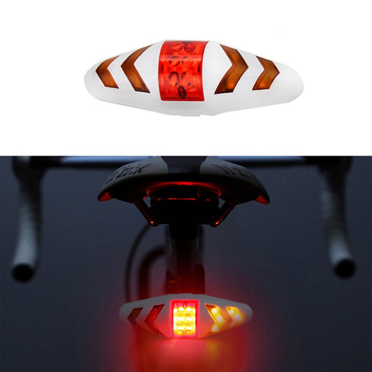 Bicycle tail light with red LED and amber arrow turn indicators on white housing