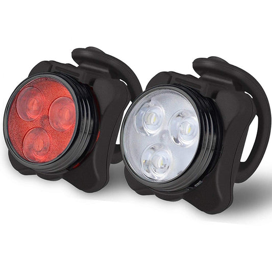 Bicycle light set with red and white LED lenses in black housings, side-by-side.
