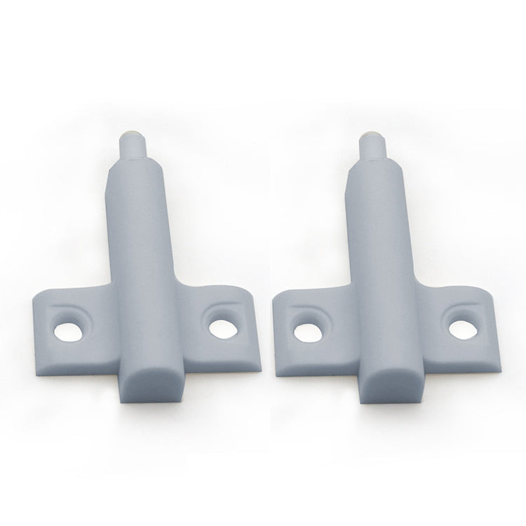 Grey aircraft-style cabinet door back buffer dampers, two pieces shown, with holes