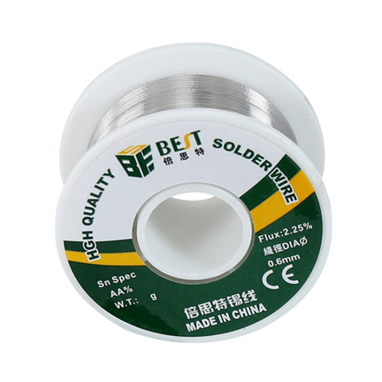 Solder wire spool with green label and silver wire wound around core