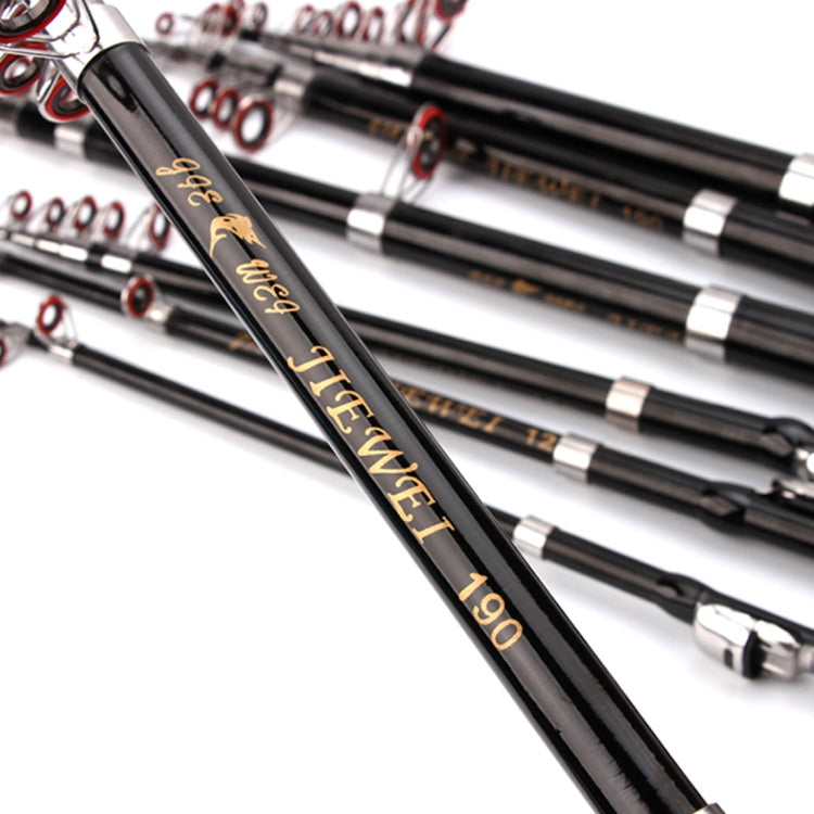 Black telescopic fishing rod with gold script markings and multiple line guides