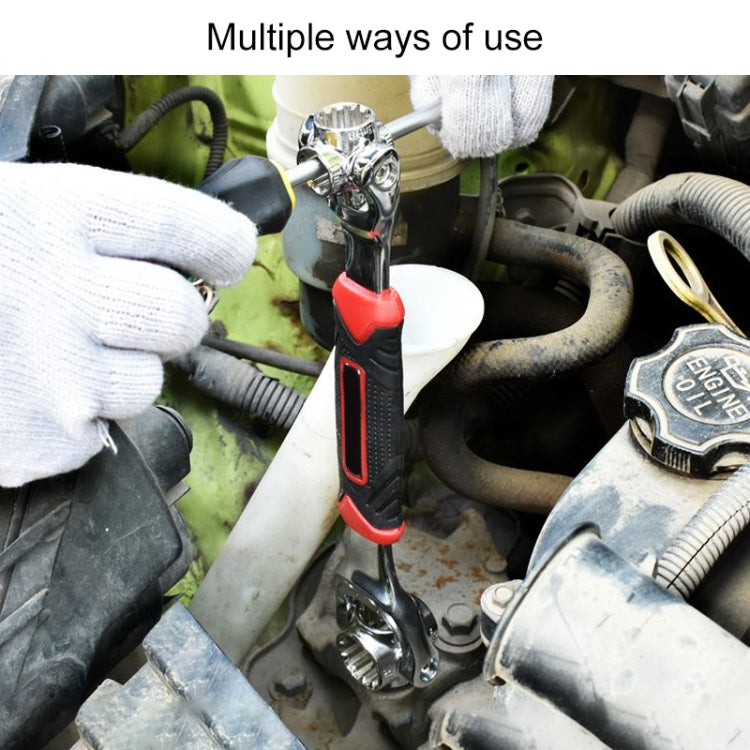 Socket wrench tool in use on engine bay with gloved hands and chrome head