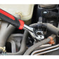 Socket wrench in engine compartment with chrome ring head and red-black handle