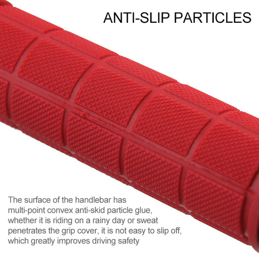 Red rubber bicycle handlebar grips with anti-slip textured surface for secure hold