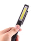 Handheld black COB LED pen light showing vertical light window