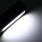 Black COB LED pen light casting a bright beam from the lens