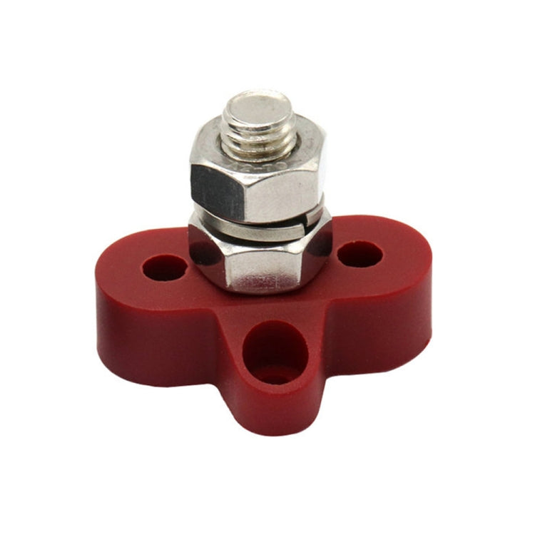 Red terminal stud block with metal hex nut and threaded stud, side mounting holes
