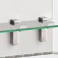 Two brushed metal fixed glass clip brackets supporting a glass board edge