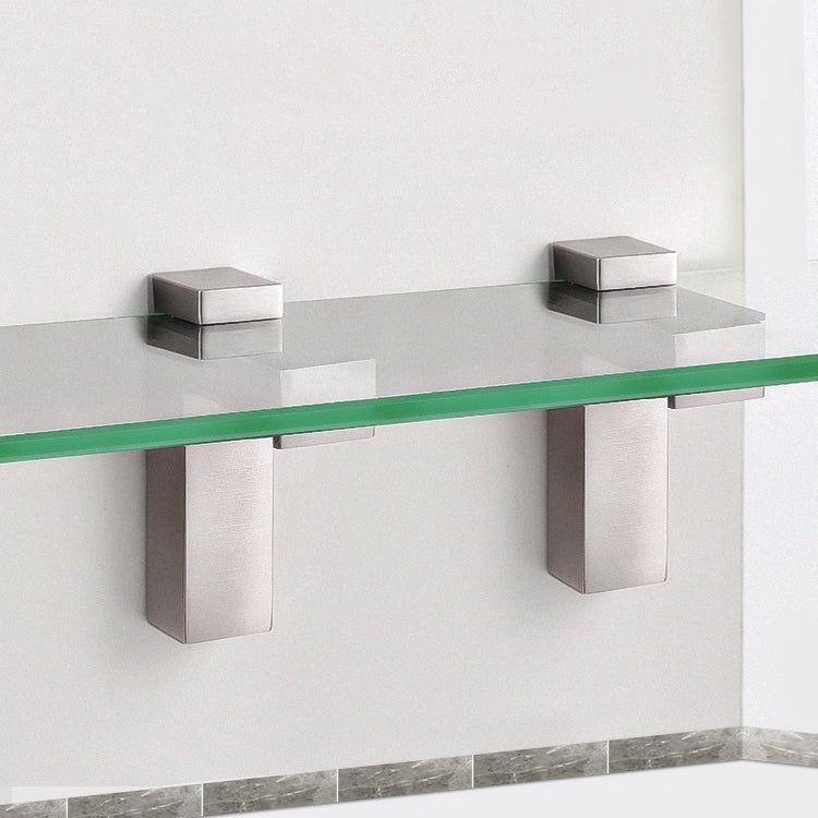 Two brushed metal fixed glass clip brackets supporting a glass board edge