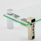 Fixed glass clip bracket securing a glass shelf corner with metal side housing