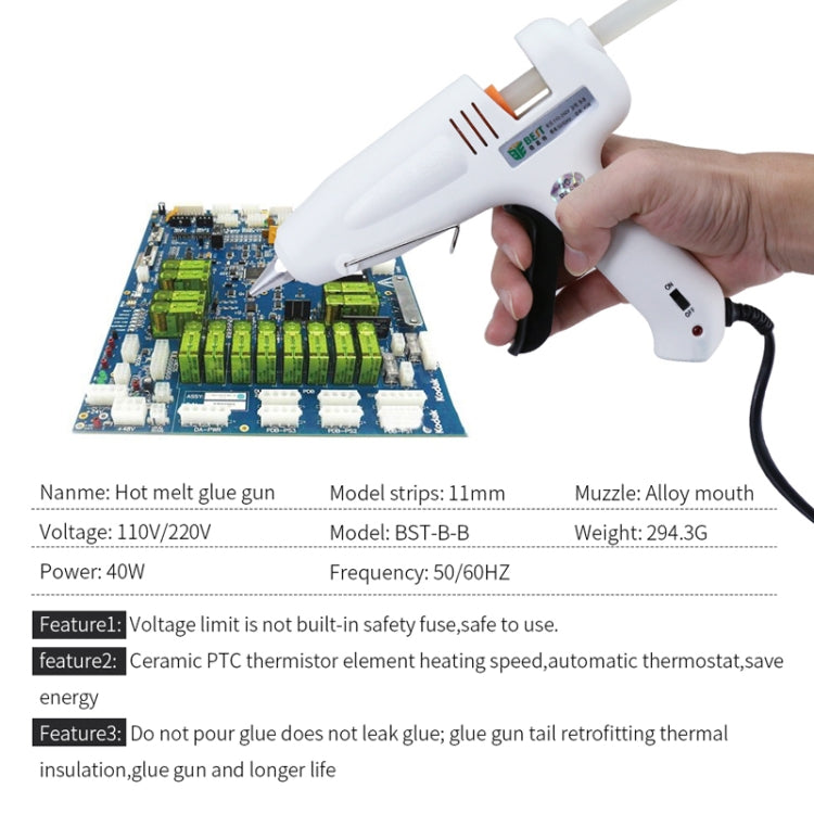 White hot pneumatic glue gun held by hand above a circuit board for welding