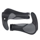 Pair of black rubber mountain bike handlebar grips with textured gray palm pads and horn.