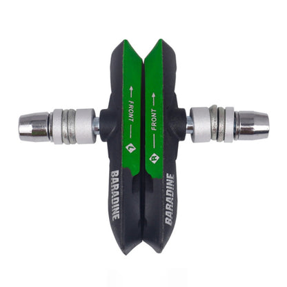 Green bicycle disc brake pads with metal mounting hardware and front direction arrows