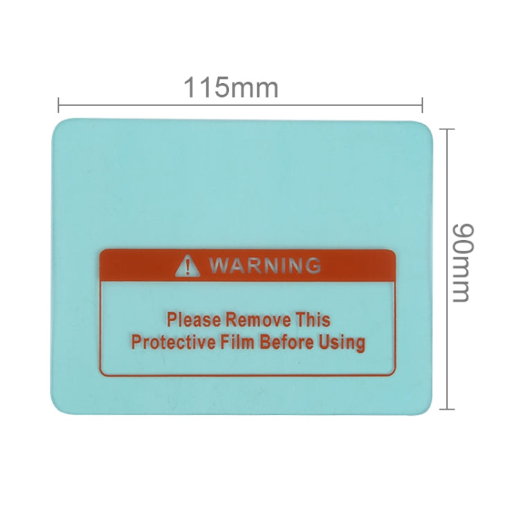 Turquoise welding helmet protective film cover with WARNING label, 115x96mm