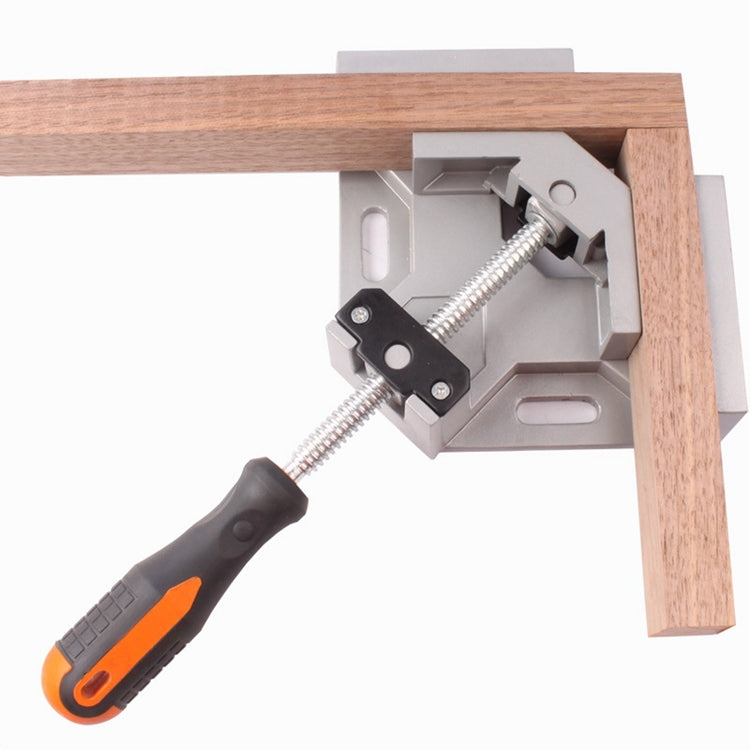 Aluminum 90-degree right-angle clamp holding a wooden frame with single black handle