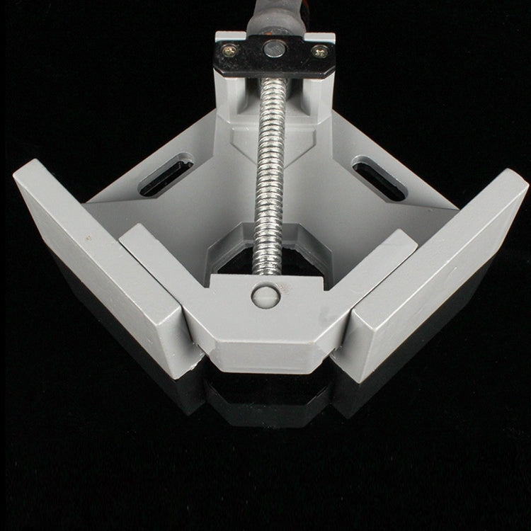 Top view of aluminum right-angle clamp with threaded rod and mounted fastener plates