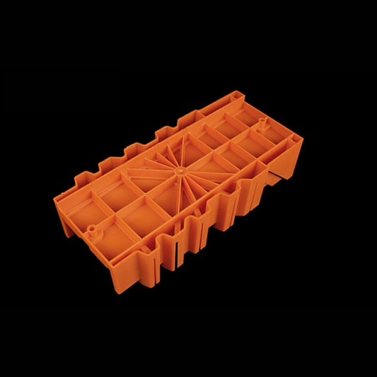 Orange miter box jig with multi-cell insert grid and central pivot