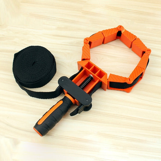 Orange folding corner clamp with black handle and attached black nylon strap