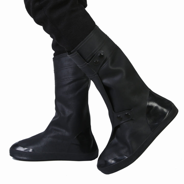 Black high tube adult shoe covers with two-button straps and thick boot soles