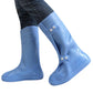 Light blue high tube adult shoe covers with snap button straps and flat soles