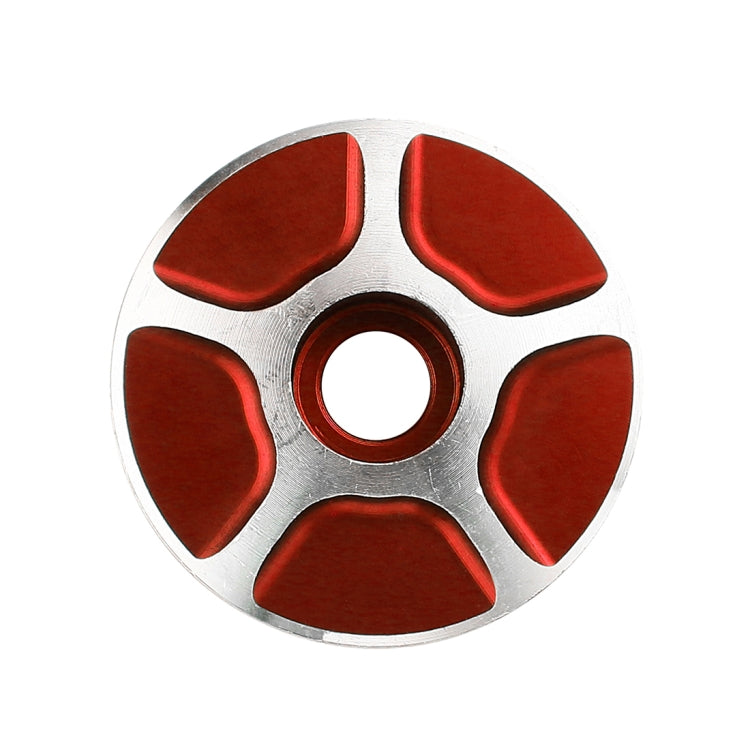 CNC aluminum bike headset cap, silver face with red inset pads and circular center hole