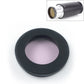 1.25-inch astronomical telescope filter with purple lens and black housing