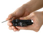 Hands adjusting black KEO-style locking pedal with Allen key