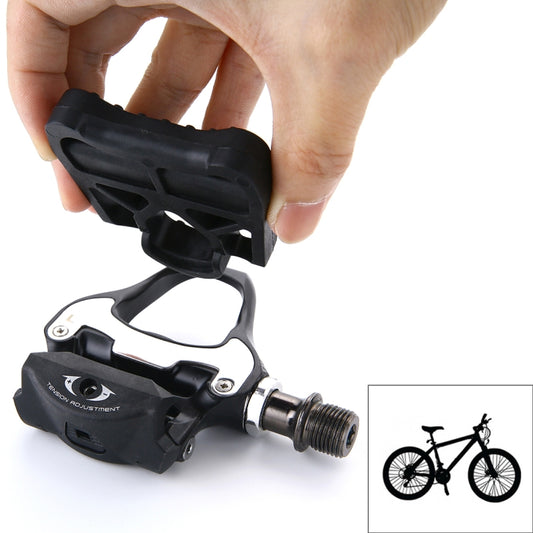 Black locking road bike pedals with KEO-style cleat adapter and threaded axle