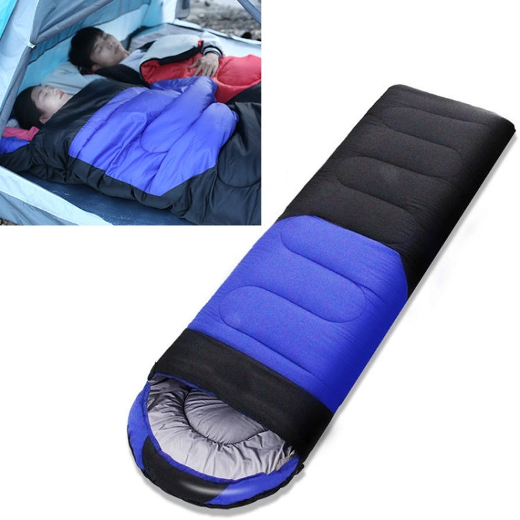 Blue and black padded sleeping bag with rounded hood, lying flat