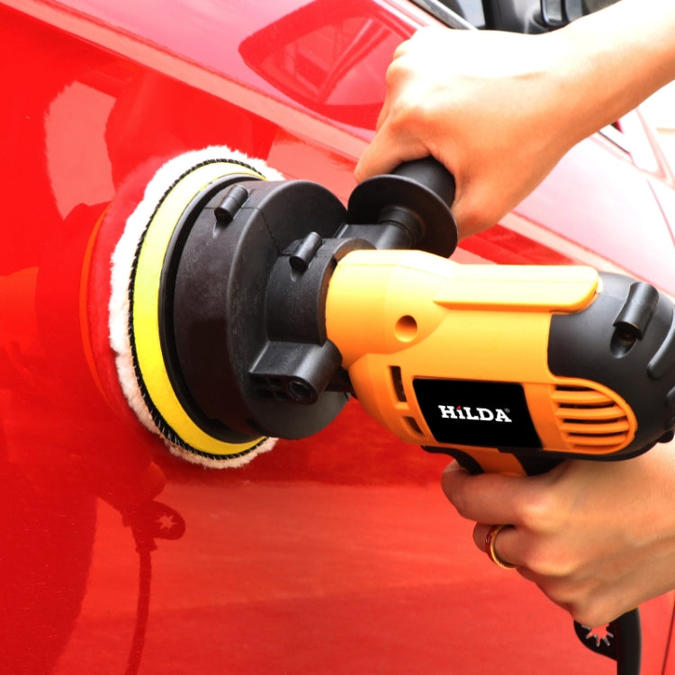 Hilda automatic car polisher with yellow-and-black rotary polishing pad and side handle