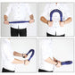 Blue spring hand grip exerciser held at sides during arm workout