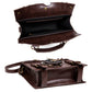 Brown crossbody bag open view showing dark lined interior and gear-strap front details