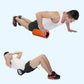 Orange high-density foam roller used for floor exercise in a plank position